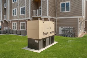 Commercial generator outside of an apartment complex.